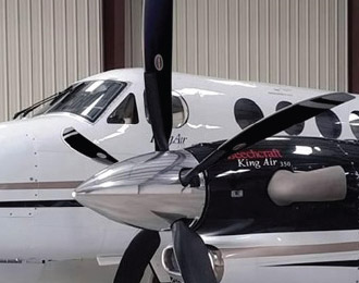 Side view of a Beechcraft King Air 350 with a 5-blade Hartzell propeller