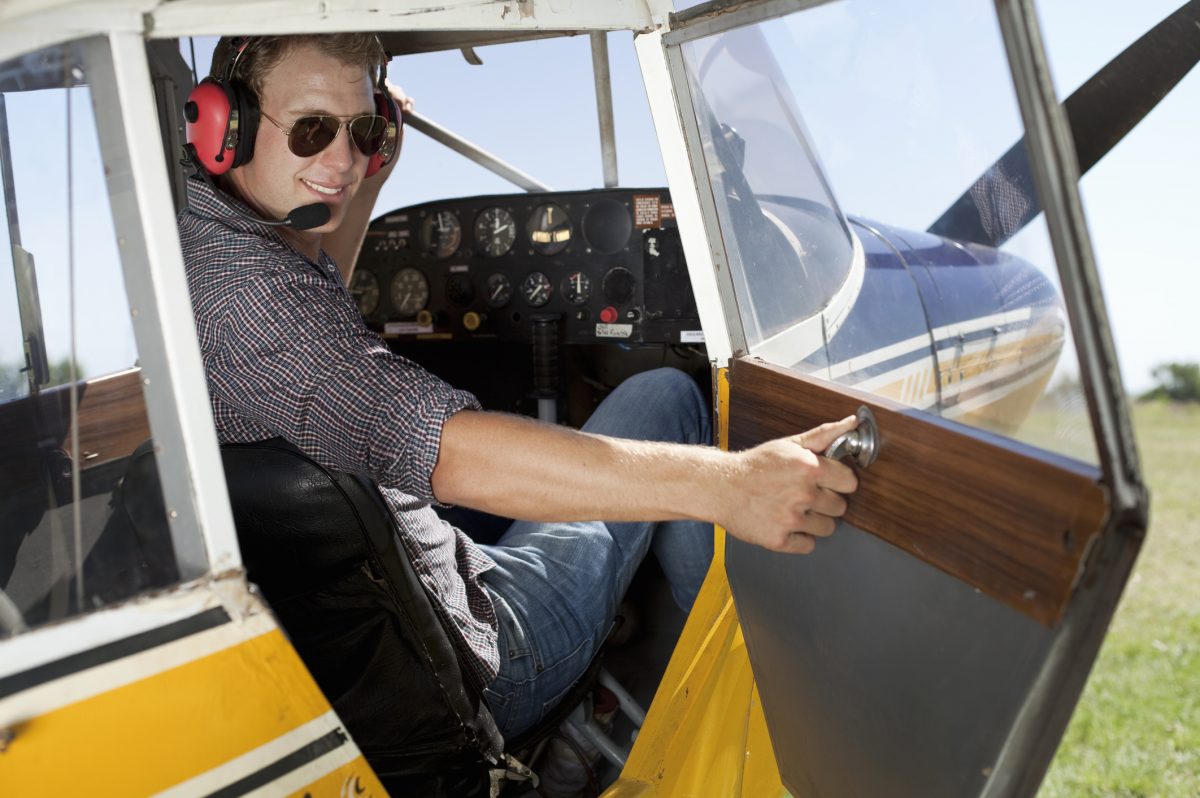 young pilot in a propeller-driven plane